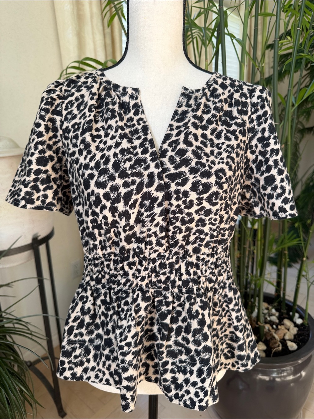 Anthropologie Black and White Leopard Print Peplum Top